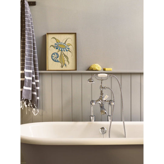 Chrome finished vintage-style bathtub faucet granite with curved spout and separate hot and cold handles