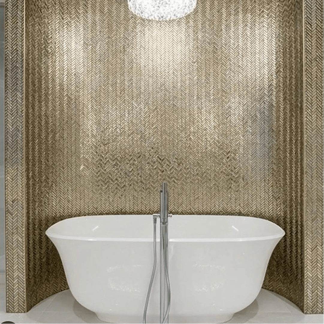 Gravity Aluminium Arrow Metal Mosaic grey chevron aluminium mosaic with a white freestanding bathtub