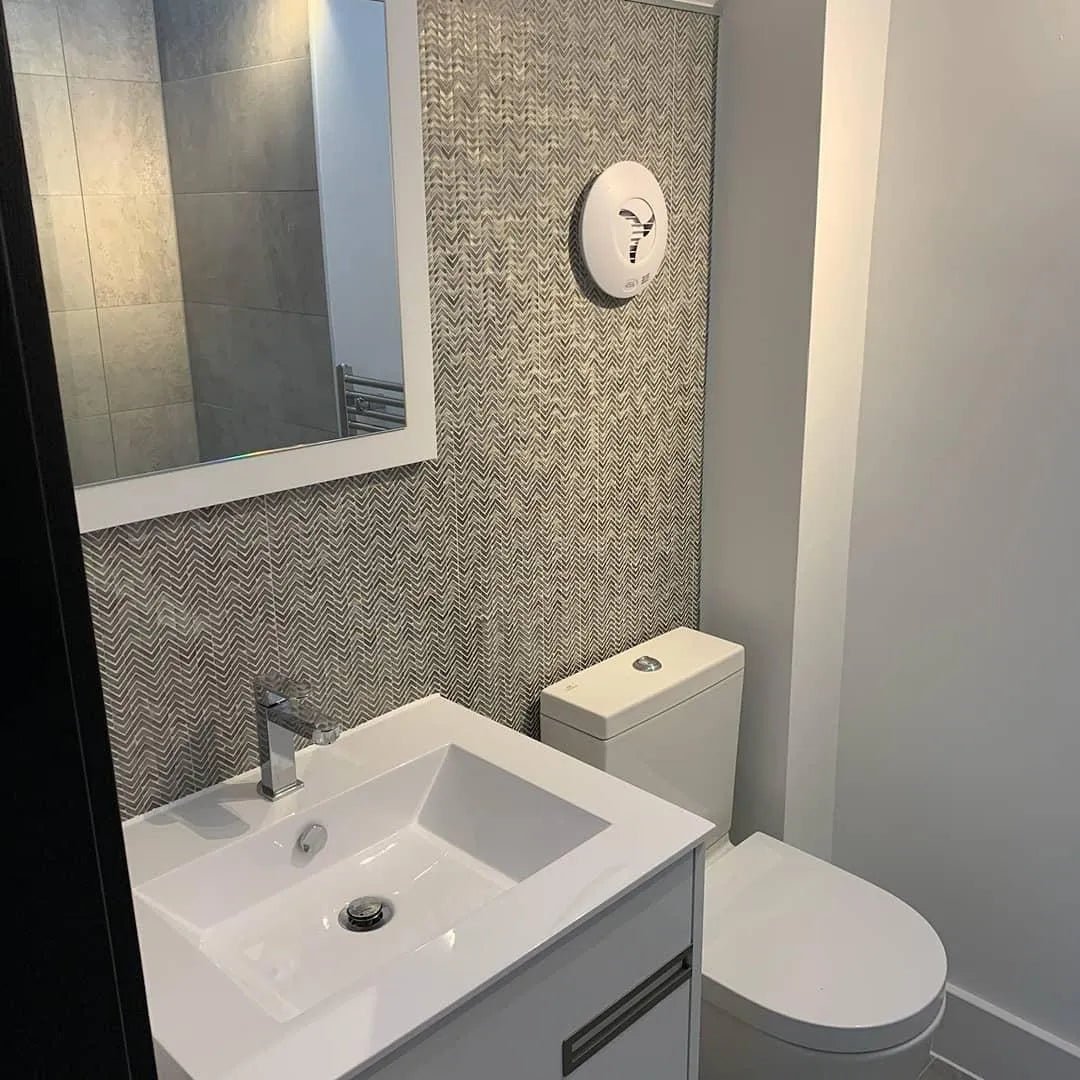 Gravity Aluminium Arrow Metal Mosaic grey chevron aluminium mosaic with a white sink on a white vanity