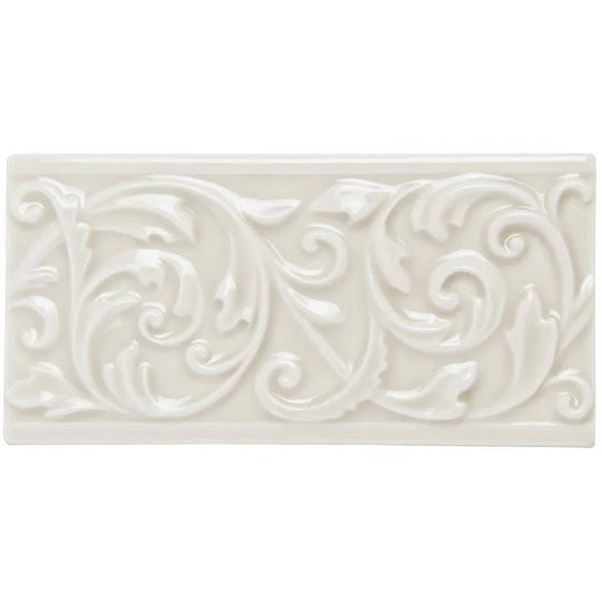 White ceramic tile hadleigh buckingham with raised ornate scrollwork design for decorative wall use
