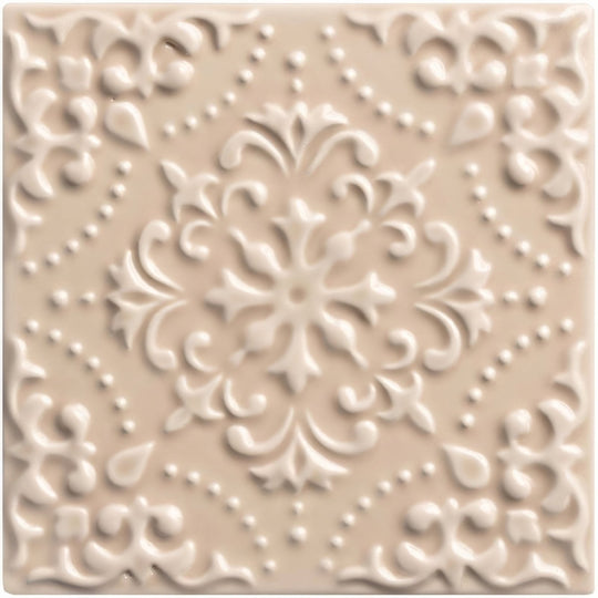 Beige ceramic tile hadleigh highgrove with raised ornate floral and scrollwork design for decorative use