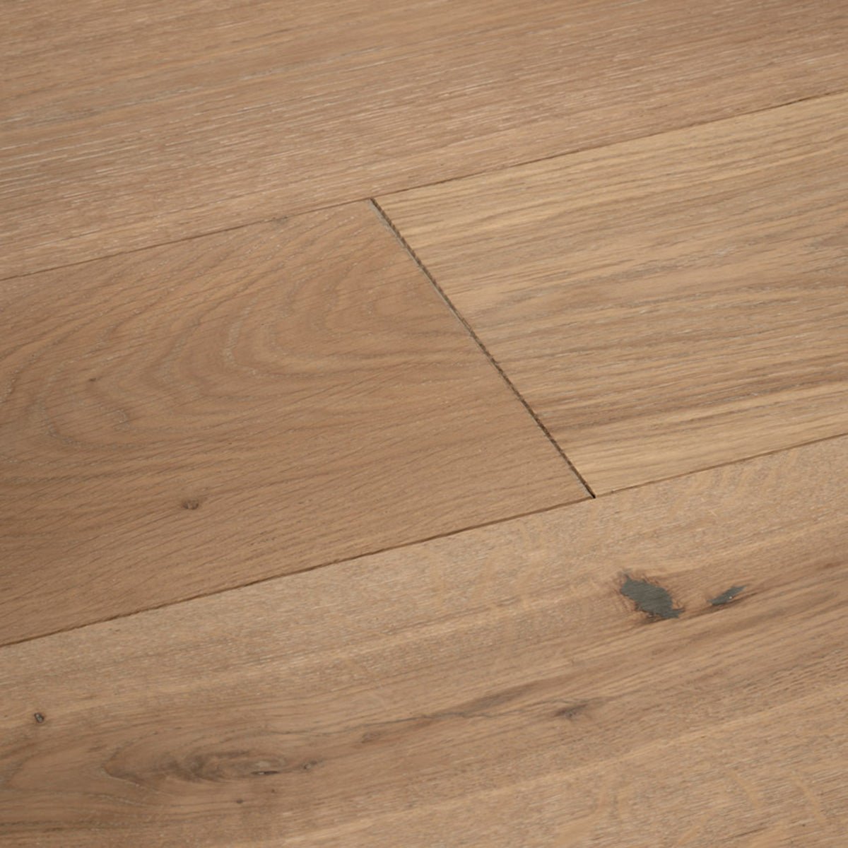 Harlech ecru oak light oak hardwood floor planks with natural wood grain and subtle knots
