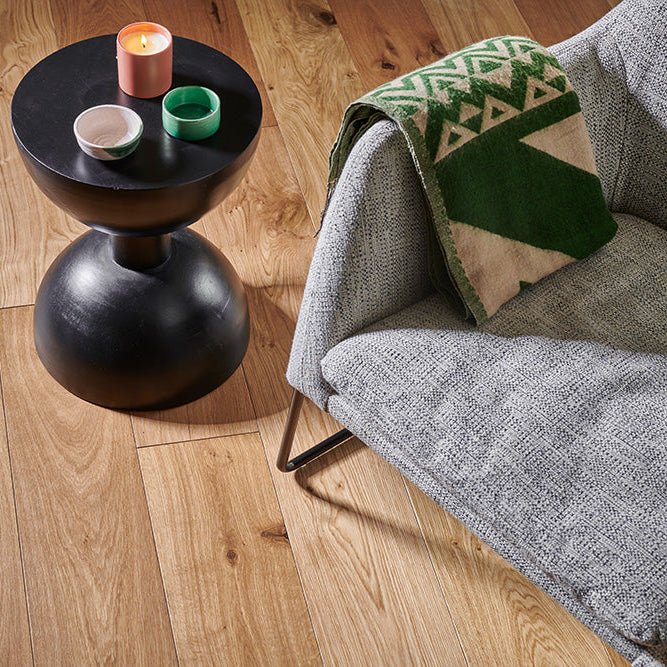 Harlech rustic oak black matte-finished round side table with sleek modern design and durable material