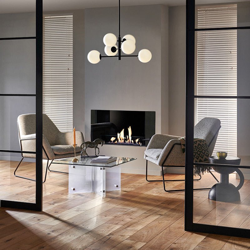 Modern black and white spherical pendant light fixture with rustic oak accent for stylish home lighting