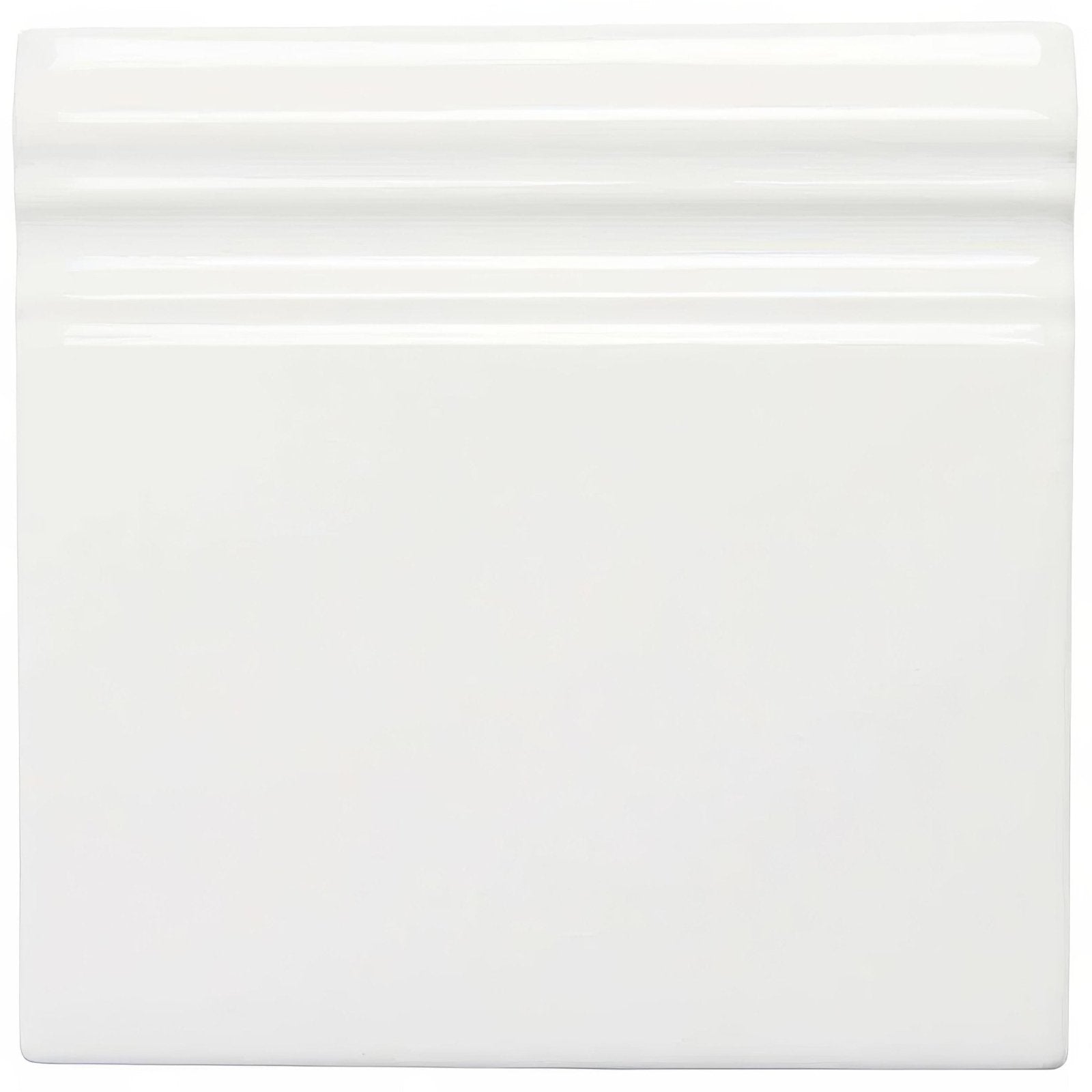 Helmingham skirting white ceramic tile with smooth glossy finish and subtle horizontal ridges along the top edge