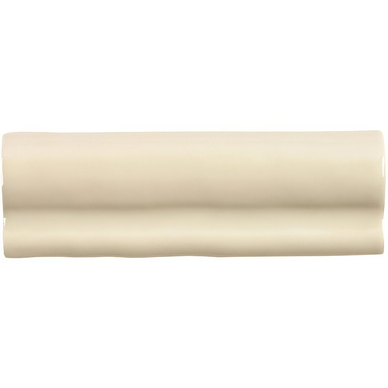 Cream-colored glossy ceramic hemp torus moulding tile with smooth rounded rectangular shape and subtle horizontal ridges
