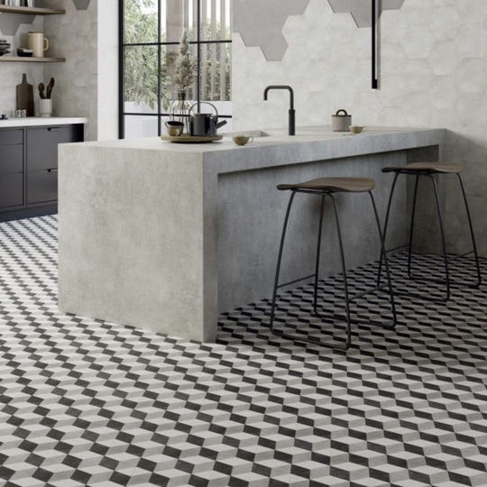 Hexagon black cube concrete kitchen island with matte gray finish and integrated sink for modern kitchens