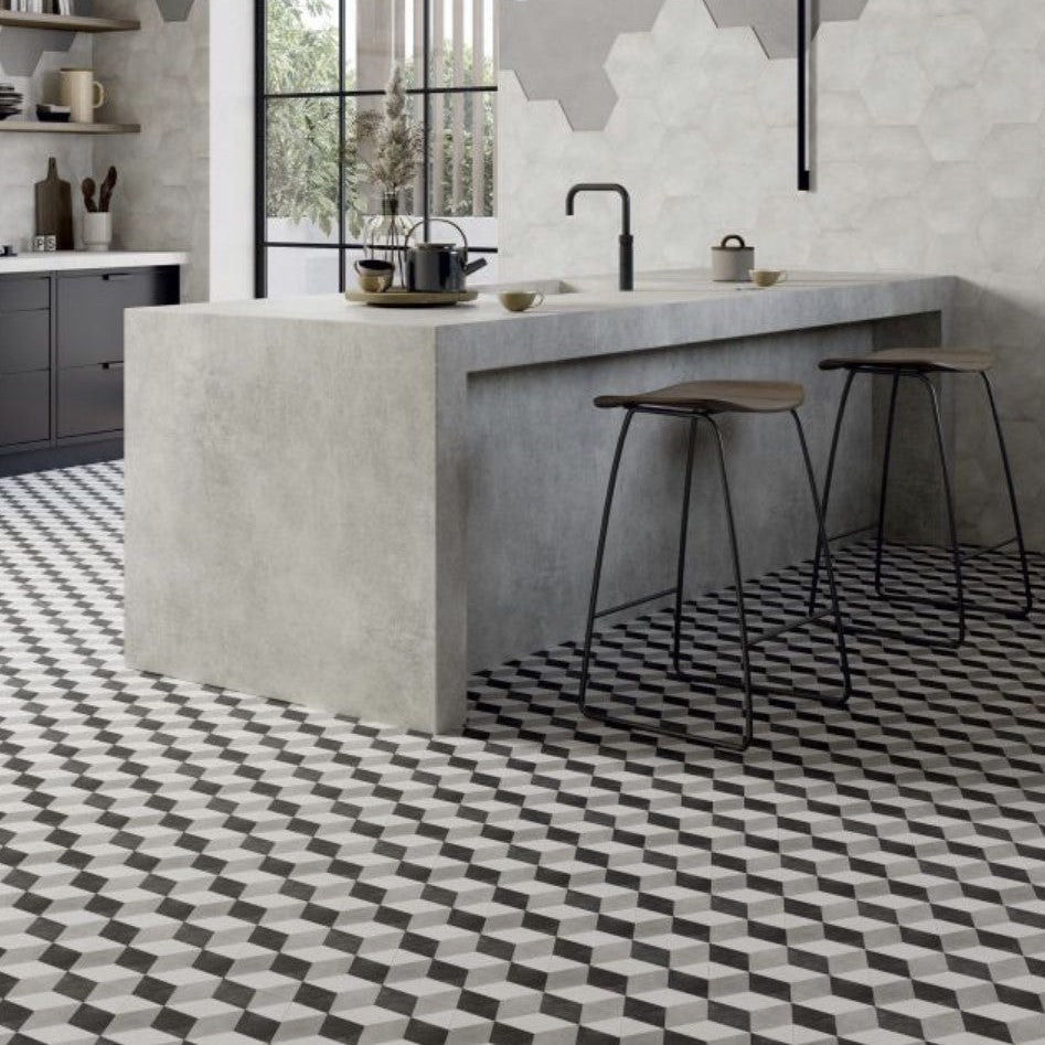 Hexagon black cube concrete kitchen island with matte gray finish and integrated sink for modern kitchens