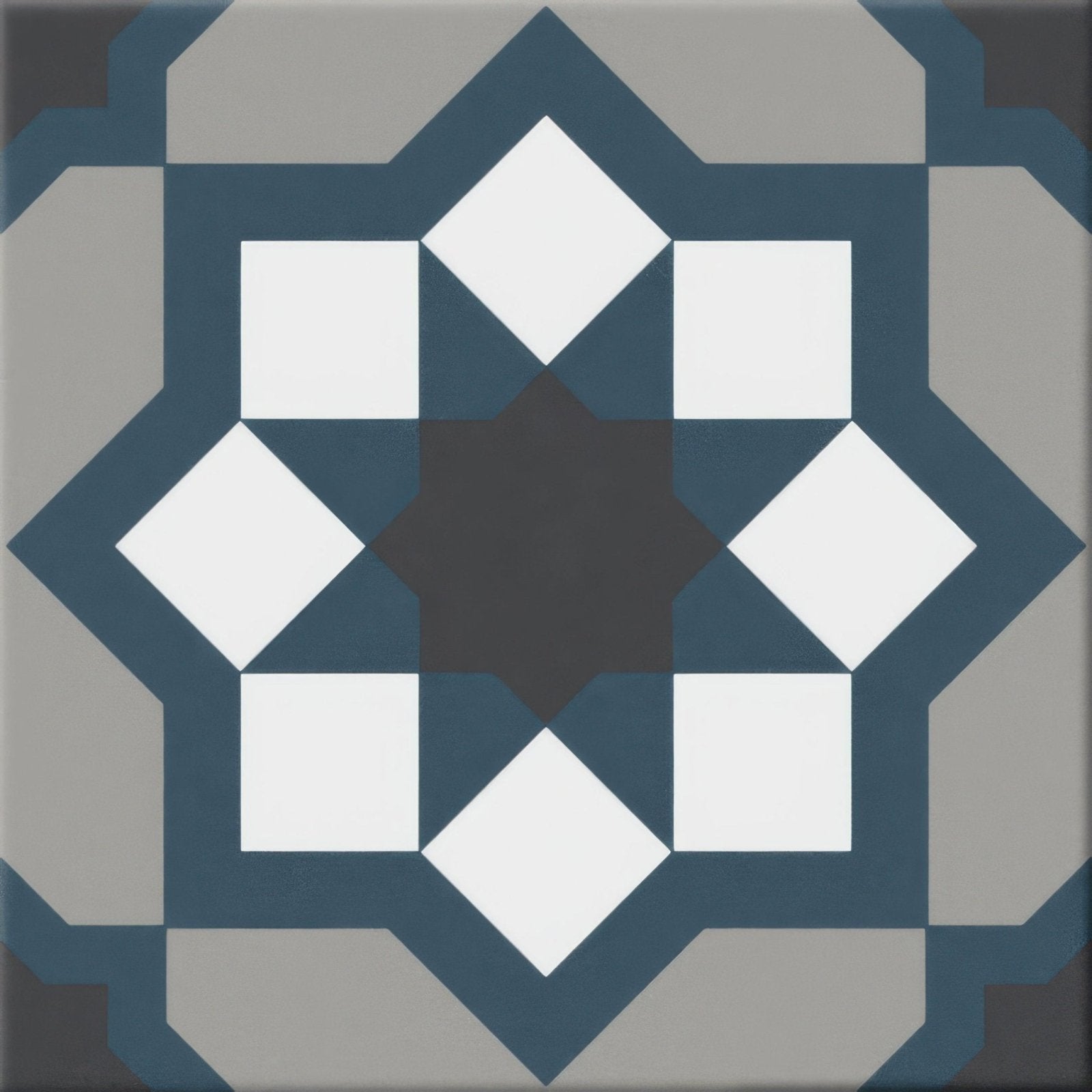 Hidra capri cold matt 20 x 20cm blue and white geometric patterned ceramic tile with central dark starburst design
