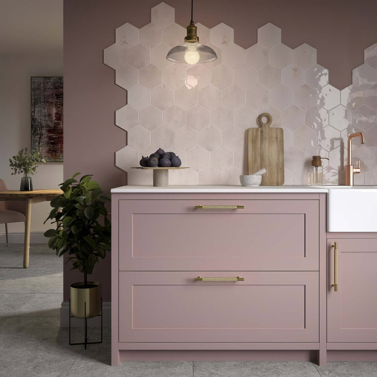 Pastel pink hope rose hexagon gloss ceramic wall tiles with gold-tone bar handles and white countertop background