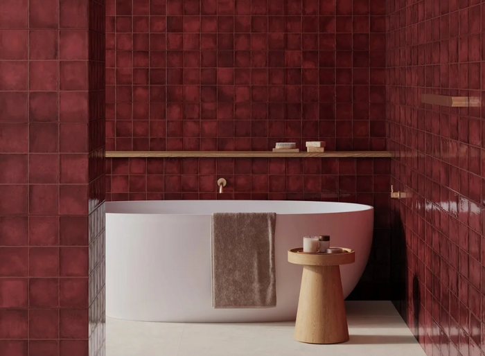 Dakota Port porcelain tiles in a rich red bathroom