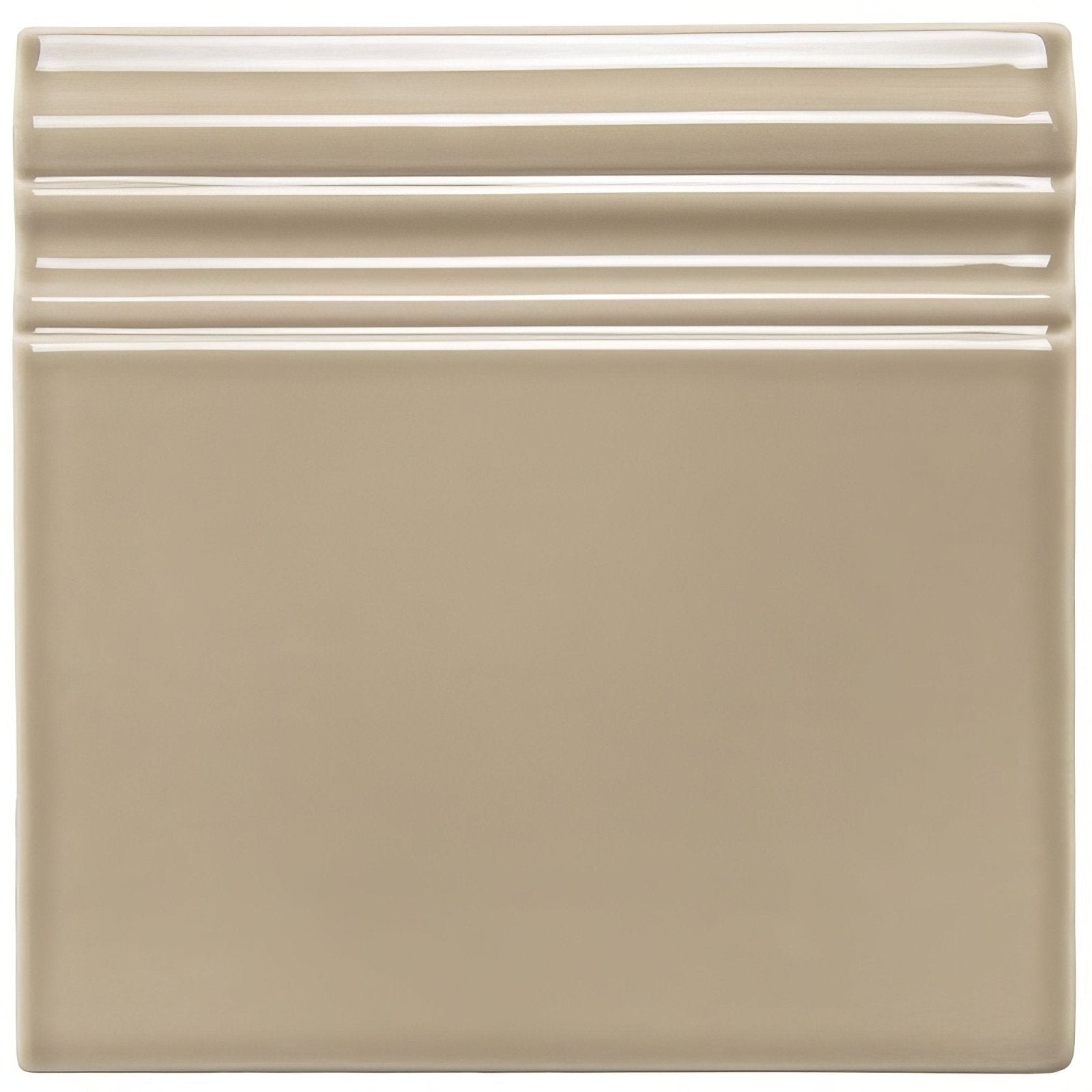 Beige ceramic Ickworth Artisan skirting tile with three horizontal ridges near the top for wall edging