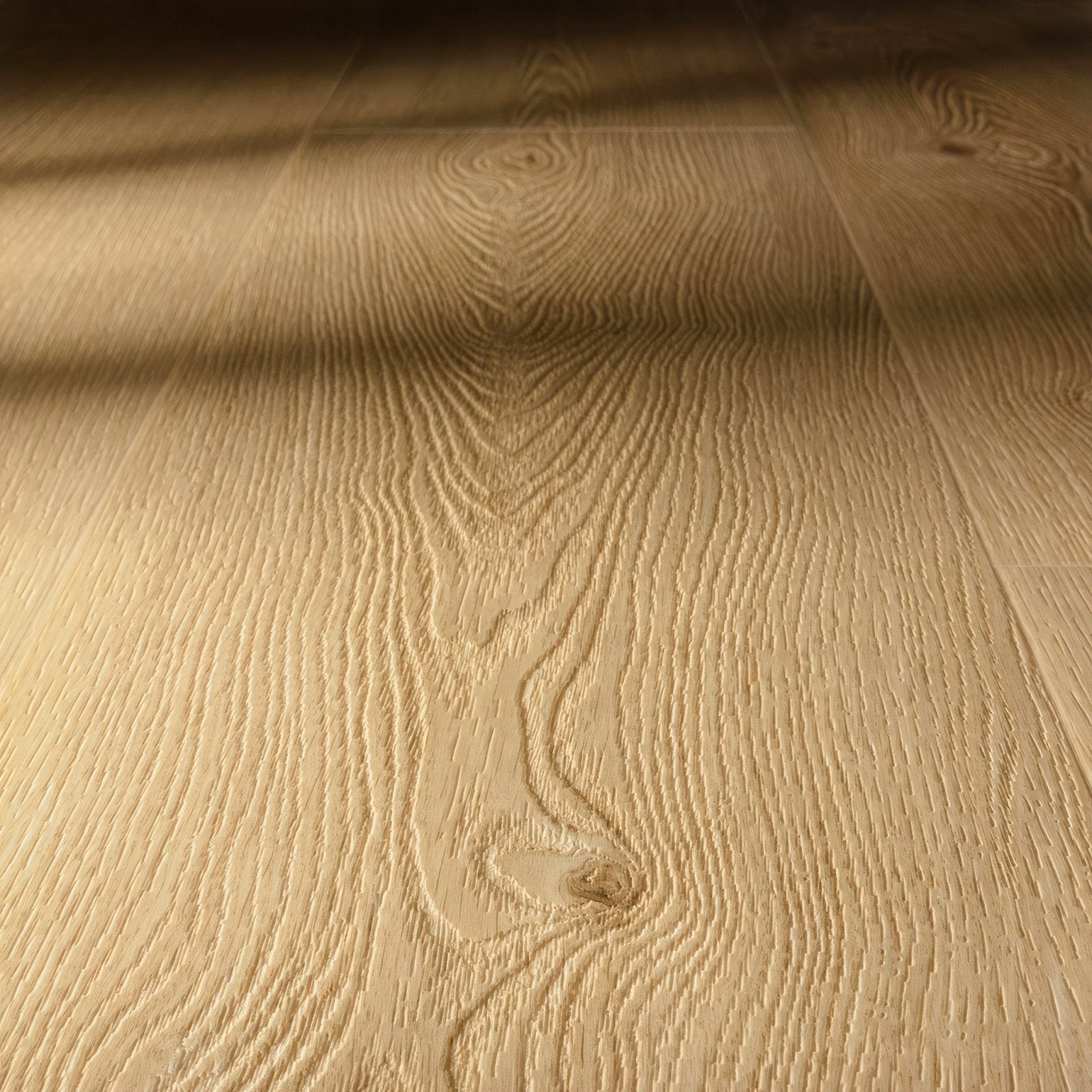 Ile de re f096 xl vinyl planks in light-colored oak with natural wood grain pattern and subtle knots hardwood flooring