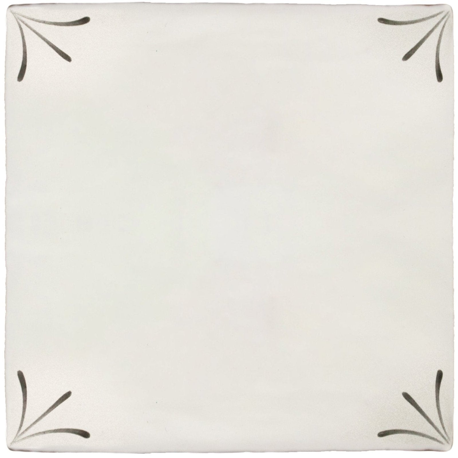 Cream-colored ceramic tile imprint delft corners with black leaf-like motifs at each corner for decorative use
