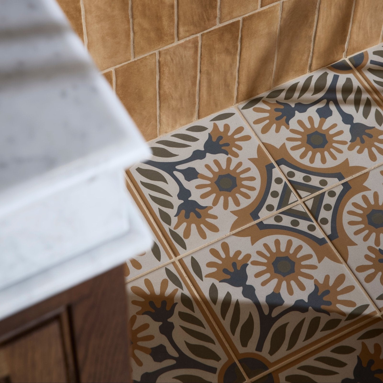 Patterned ceramic floor tiles indirah porcelain cotto 20 x 20 cm with cream base and brown navy floral motifs