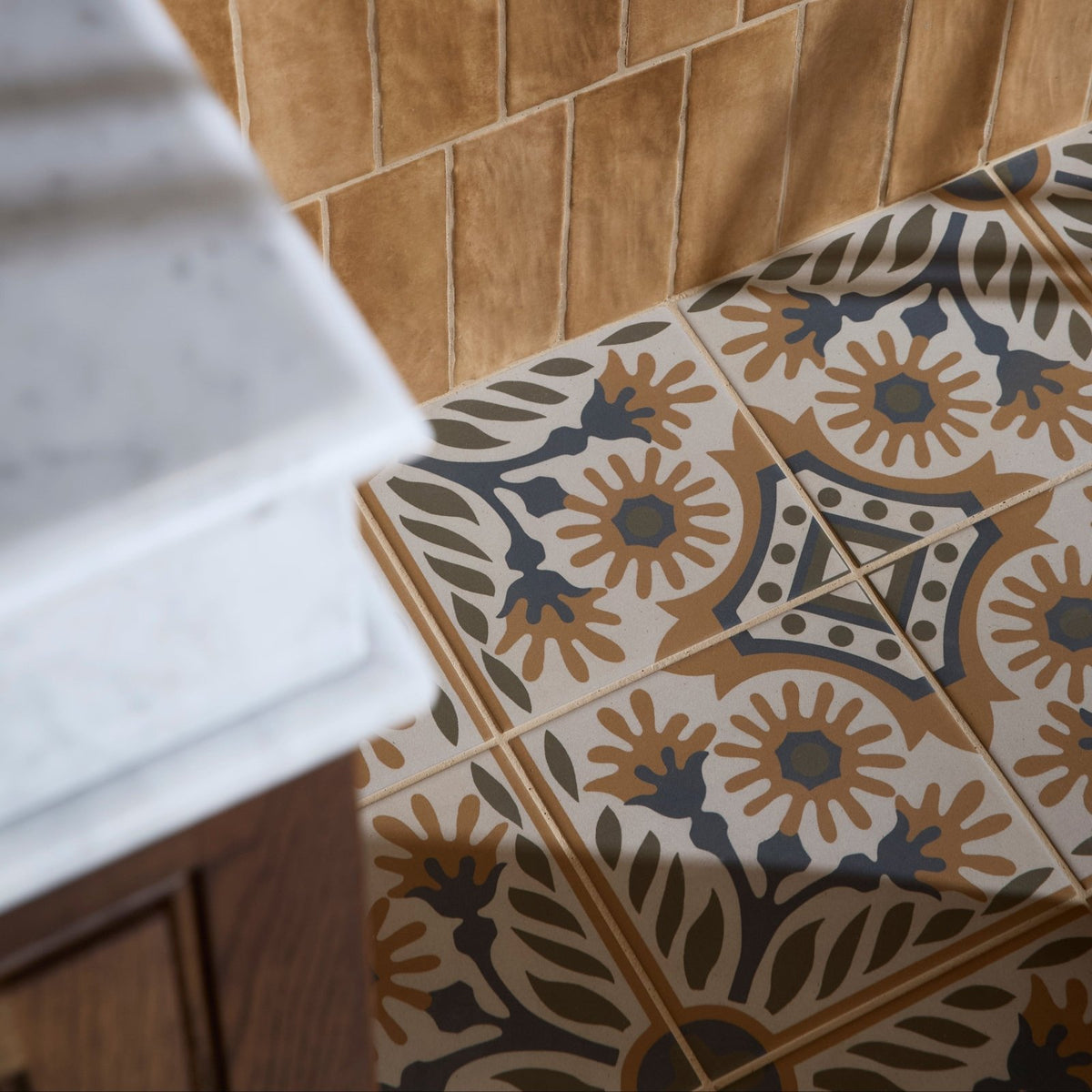 Patterned ceramic floor tiles indirah porcelain cotto 20 x 20 cm with cream base and brown navy floral motifs