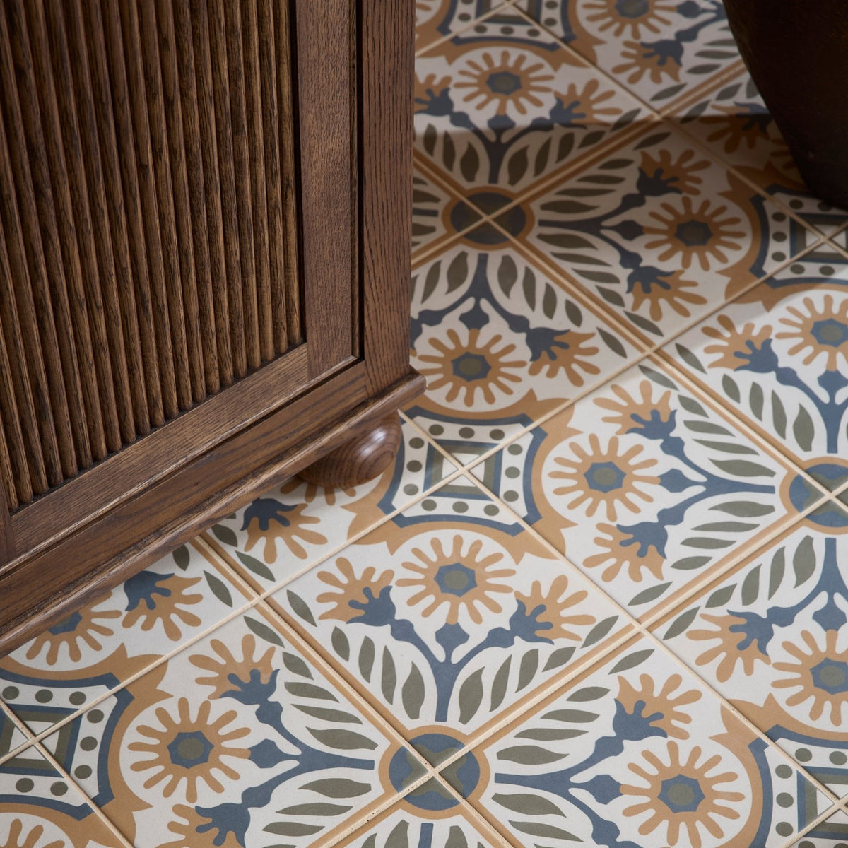 Patterned indirah porcelain cotto 20 x 20cm floor tiles with intricate blue beige and white floral and geometric designs