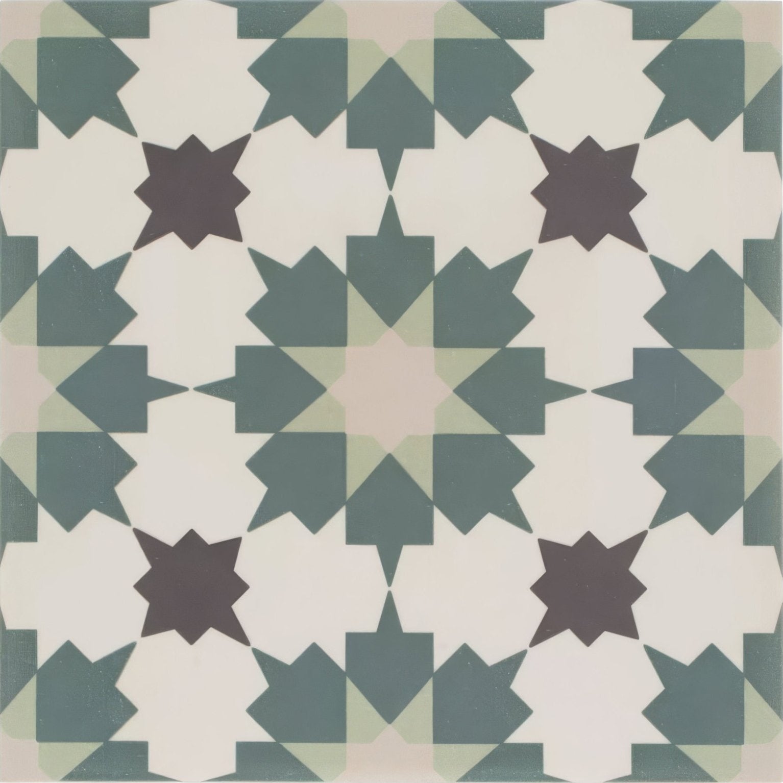 Infusion Amparo patterned tile with geometric star and diamond design in muted teal cream and dark brown tones