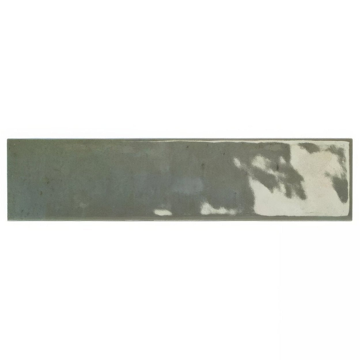 A rectangular ceramic ixworth forest brick tile with muted sage green glaze and abstract white brushstroke patterns