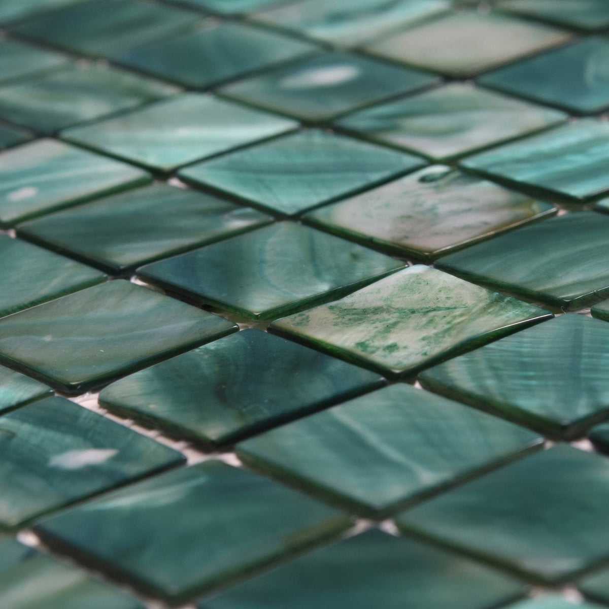 Jade 25mm square teal and green marbled mosaic tiles with a glossy natural stone finish for decorative surfaces