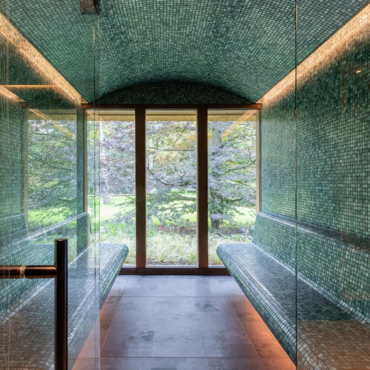 Jade 25mm Square green glass mosaic in a sauna with built-in benches