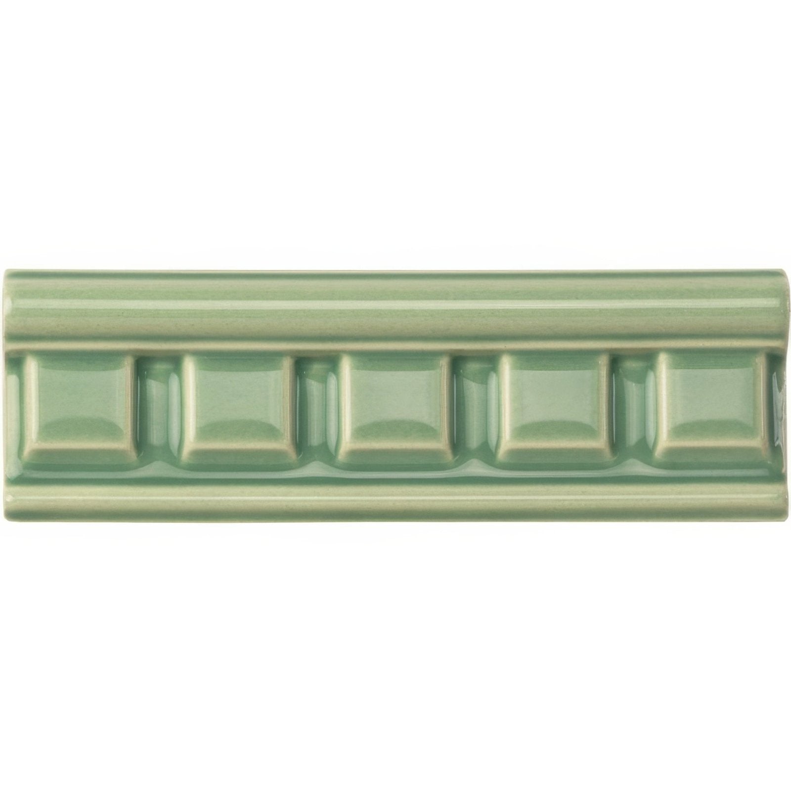Jade breeze dentil moulding is a sage green matte ceramic tile with a raised recessed square pattern in the center