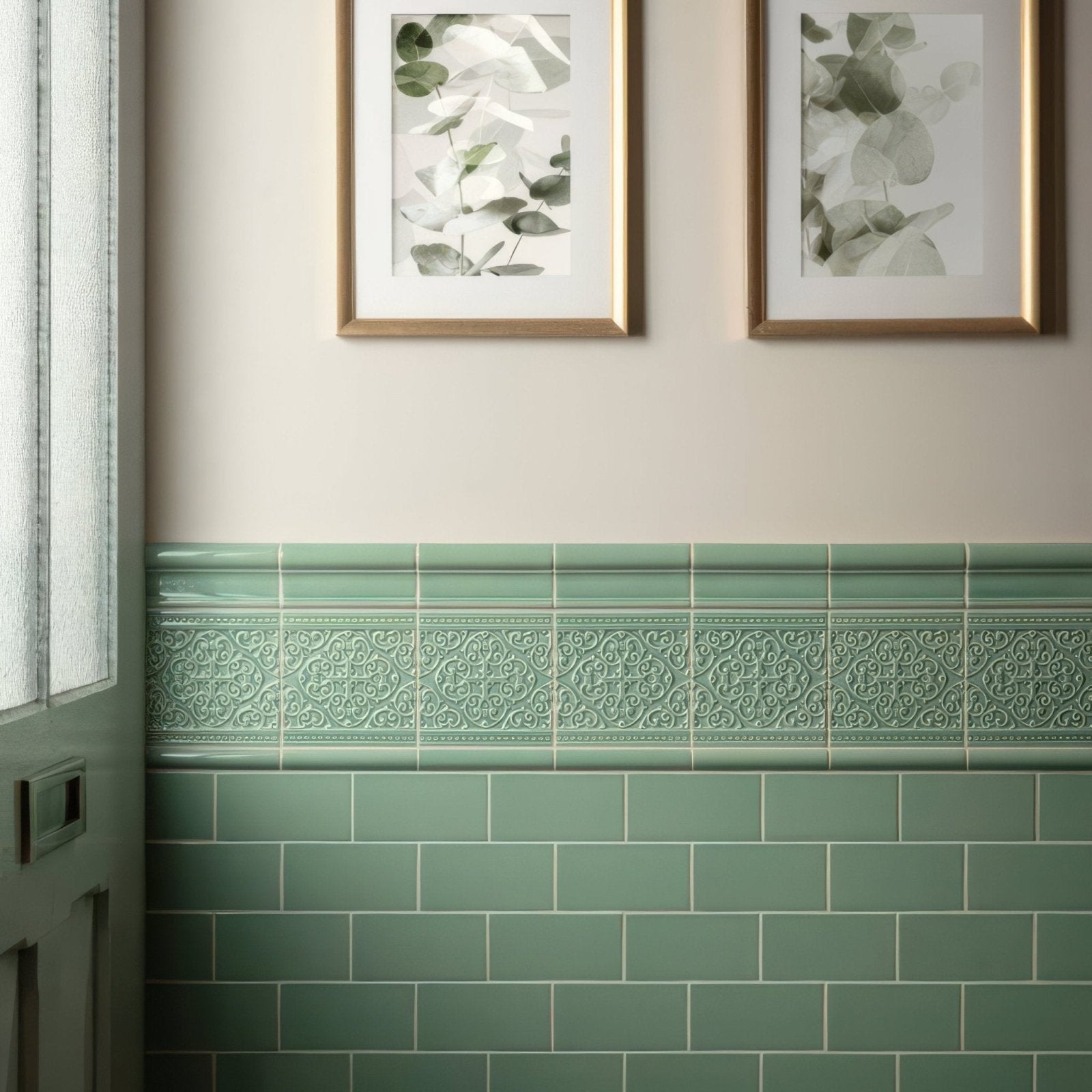 Jade breeze half tile featuring a decorative mint green ceramic border with embossed floral pattern above subway tiles
