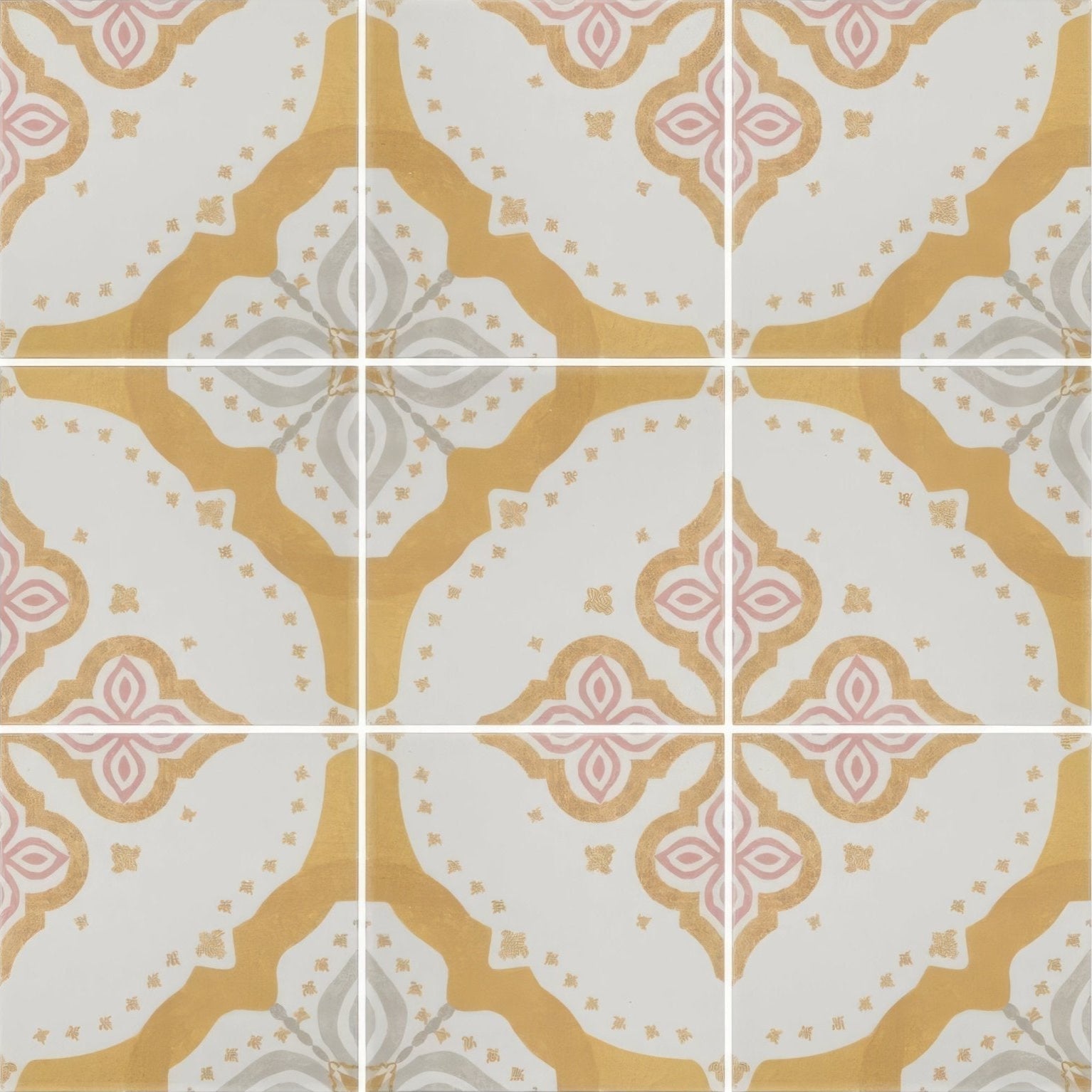 Vintage-style ceramic jaipur akola patterned tile with repeating quatrefoil pattern in soft gold pale pink and muted gray
