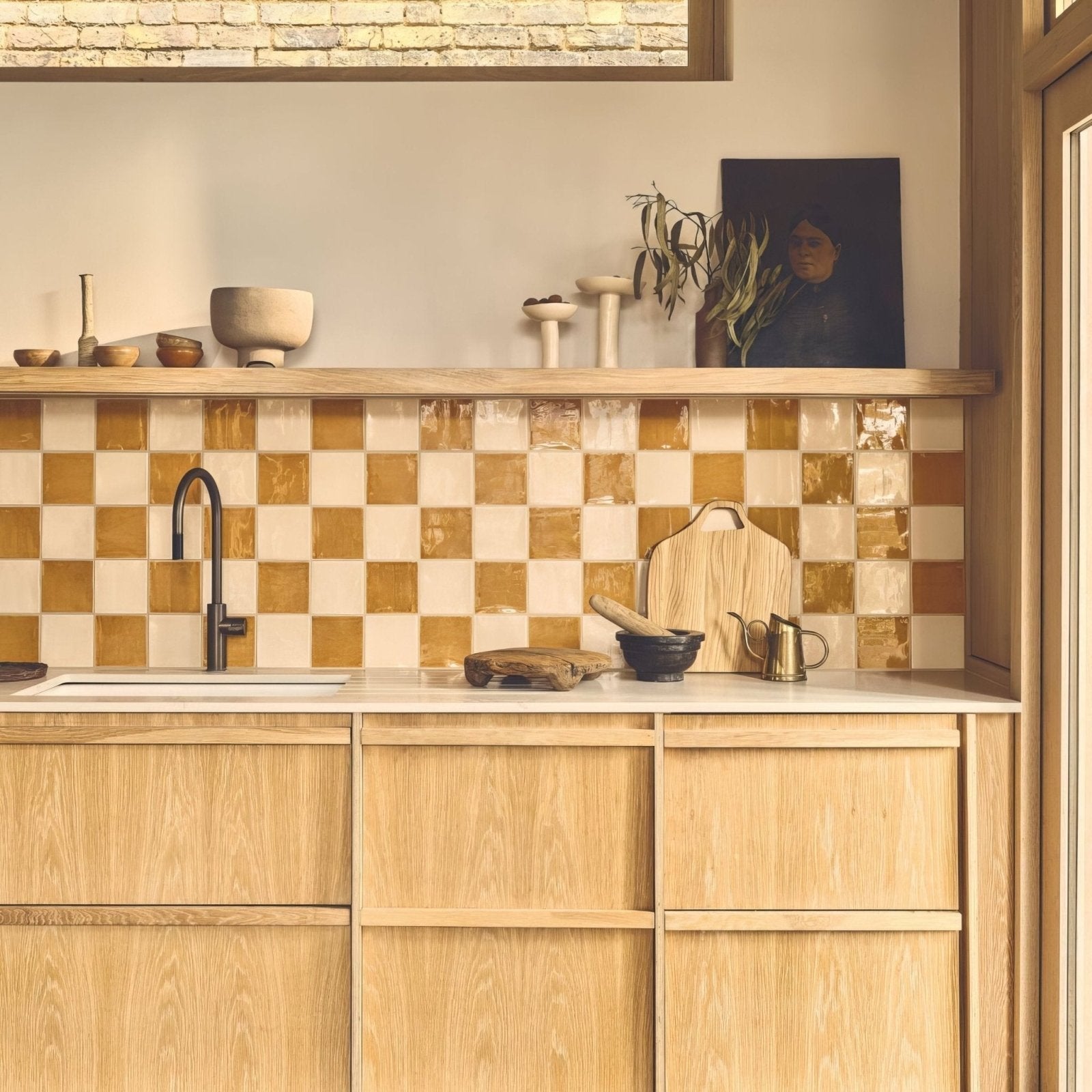 Jaipur hoppers hat square glazed tile on a rustic wooden cutting board with natural handcrafted finish and visible grain