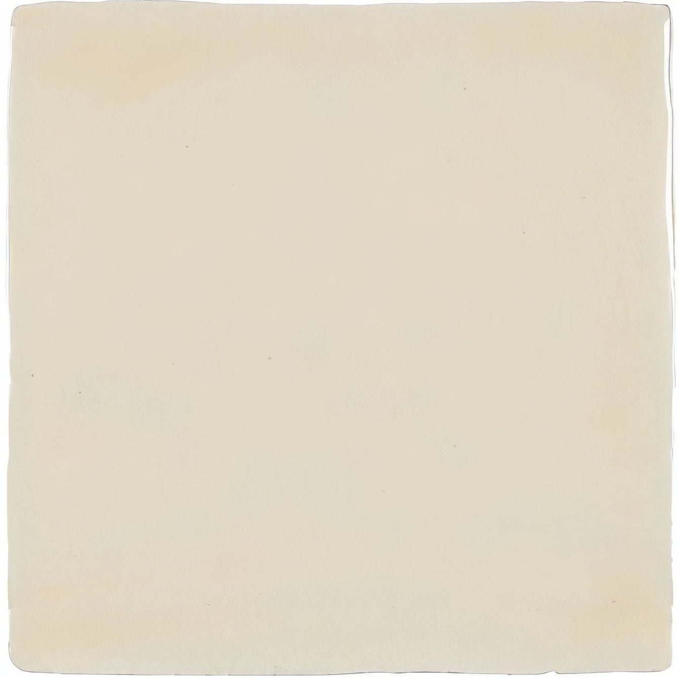 A plain off-white glazed rectangular tile with a smooth slightly textured surface from jaipur old ochre collection