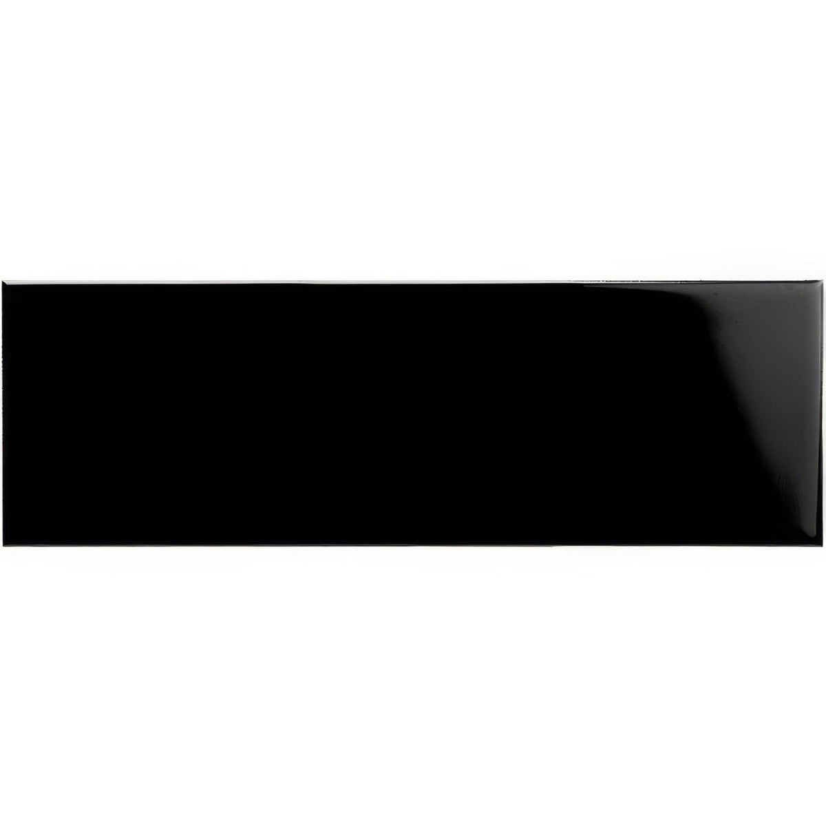 Jet Black Large Brick 228x75mm, a glossy black ceramic wall tile in the elongated brick format
