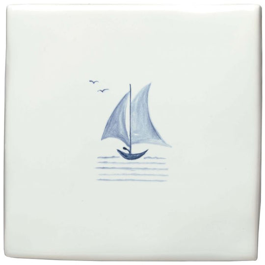 White ceramic tile featuring a hand-painted blue sailboat and two seagulls above stylized water lines by jim howard of fowey delft boat