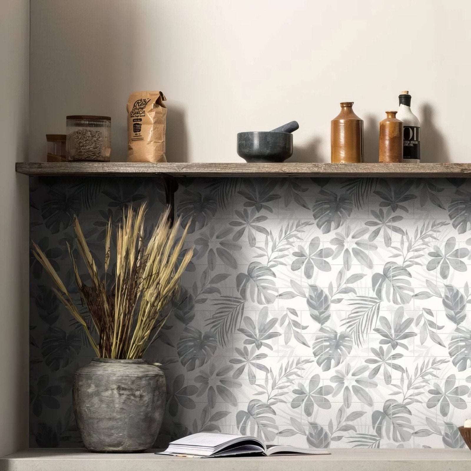 Gray textured ceramic vase holding dried golden wheat stalks displayed with jungle grove blue 18 tile panel