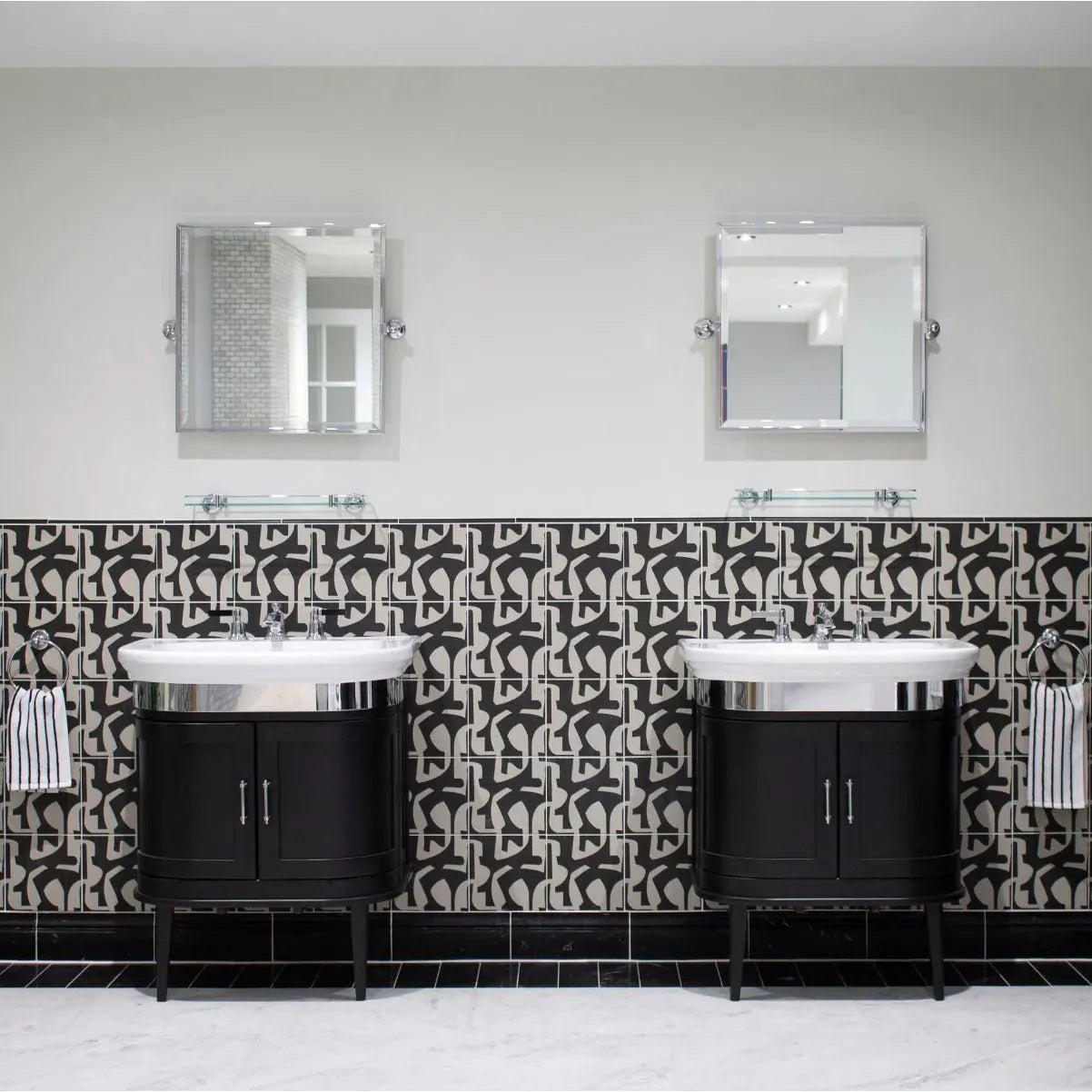 Black and white patterned bathroom vanity with chrome accents from Kelly Hoppen Puzzle Beige and Black collection