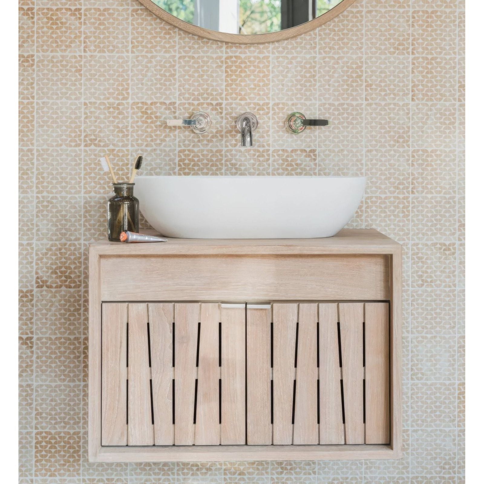 White ceramic vessel sink mounted on light wood vanity with vertical slat doors kelmscott lytes terra tile
