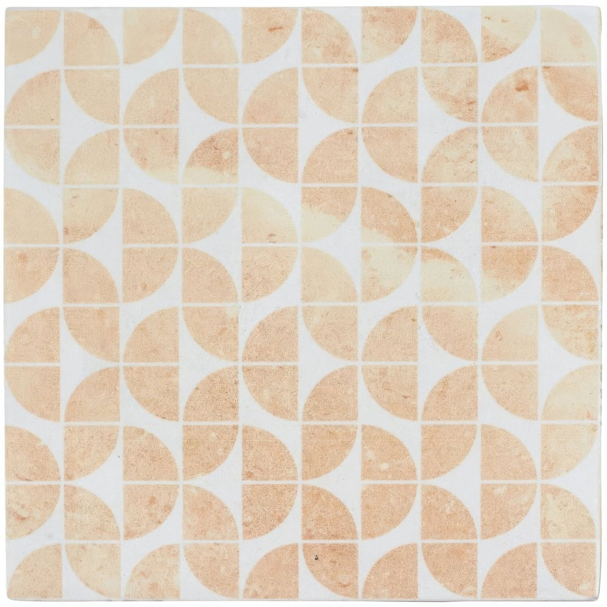 Beige kelmscott lytes terra tile with half-circle mosaic shape and subtle textured finish with white grout lines