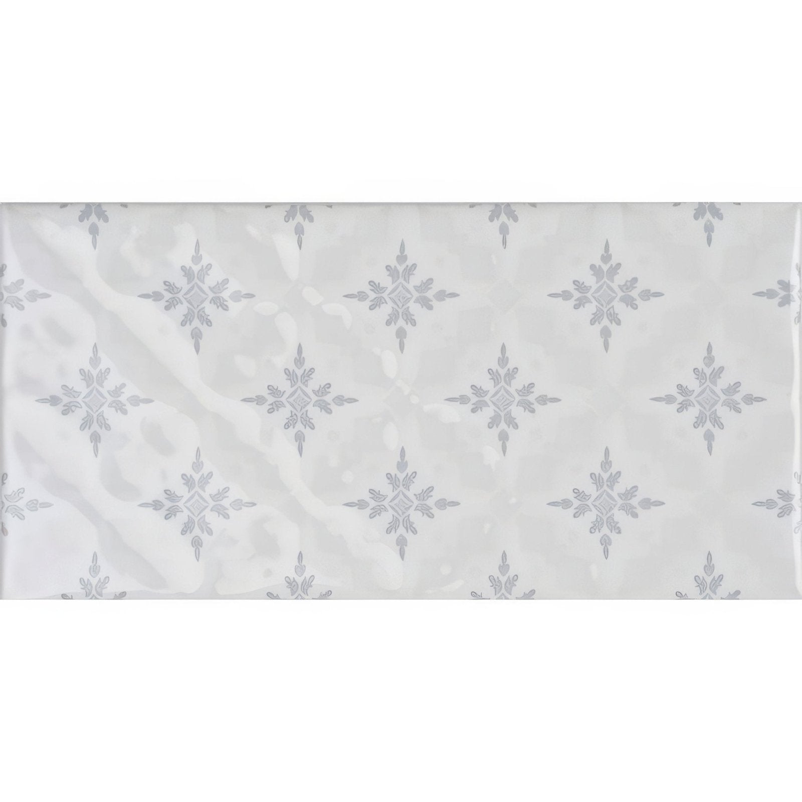 A rectangular ceramic tile kew on helmingham with a glossy white surface and silver snowflake pattern