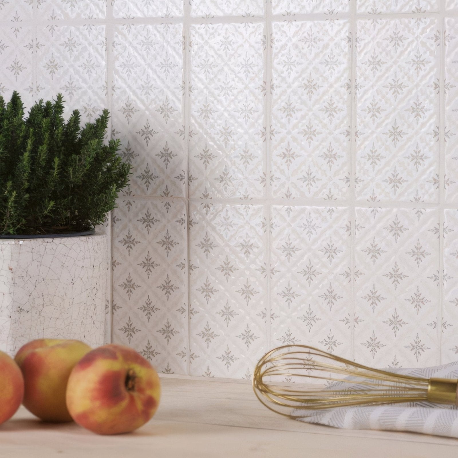 Kew on Helmingham vintage white ceramic tiles with subtle gray star pattern and raised diamond texture