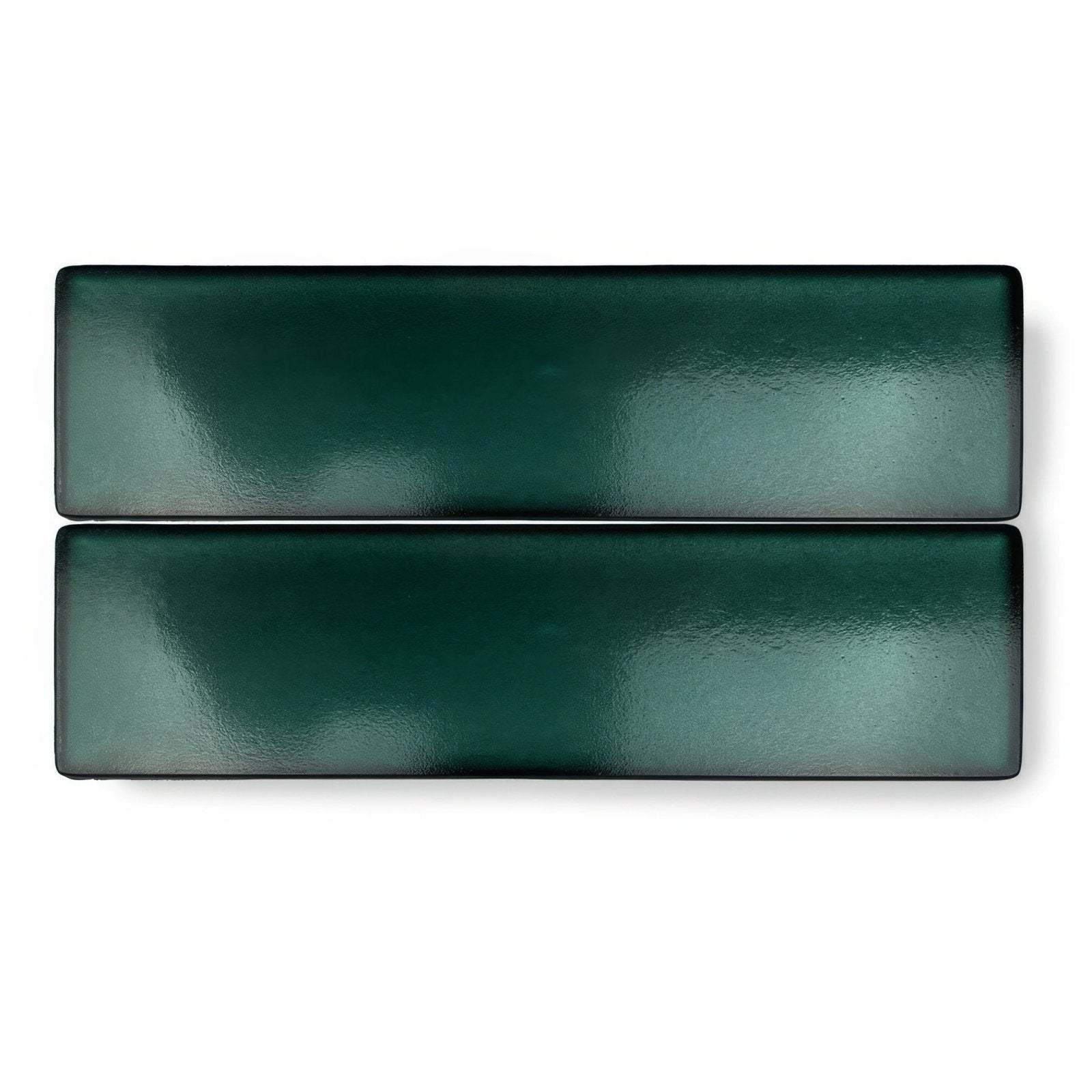 Two sleek glossy dark green rectangular ceramic kingfisher green glass wall tiles with subtle textured finish