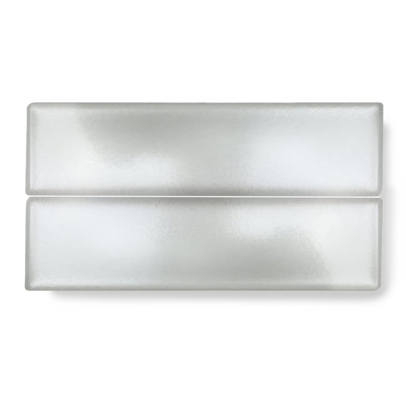 Two sleek kingfisher white glass wall tiles with frosted finish subtle metallic sheen and rounded edges