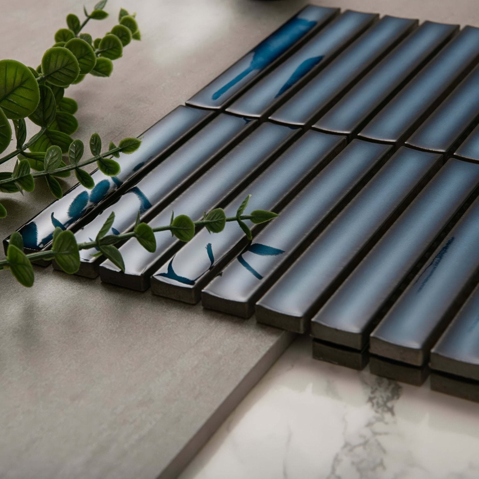 Kitkat blue mosaic ceramic tiles with a glossy finish featuring blue leaf patterned mosaic design