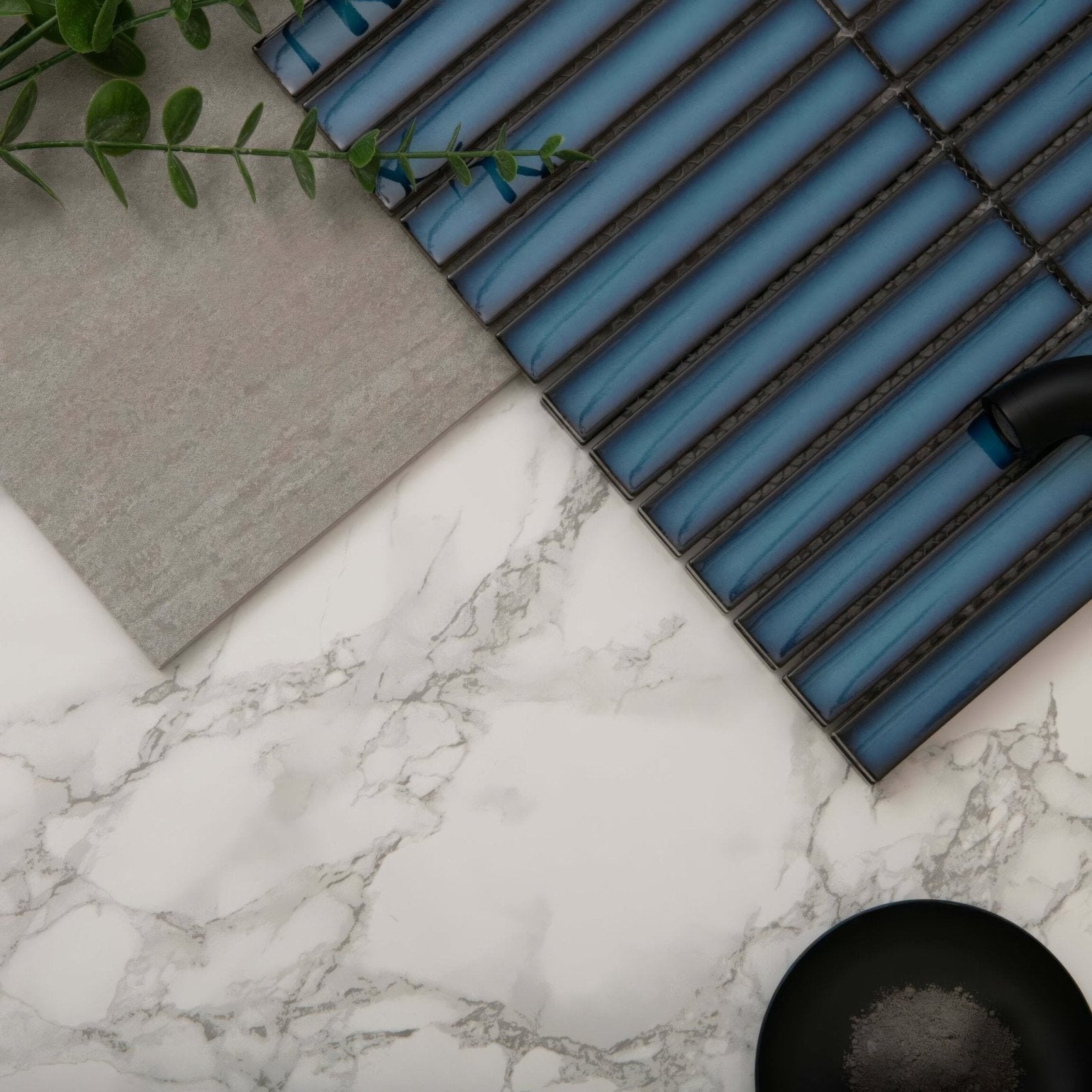 Blue rectangular glass mosaic tiles with dark grout lines from kitkat blue mosaic for decorative wall use