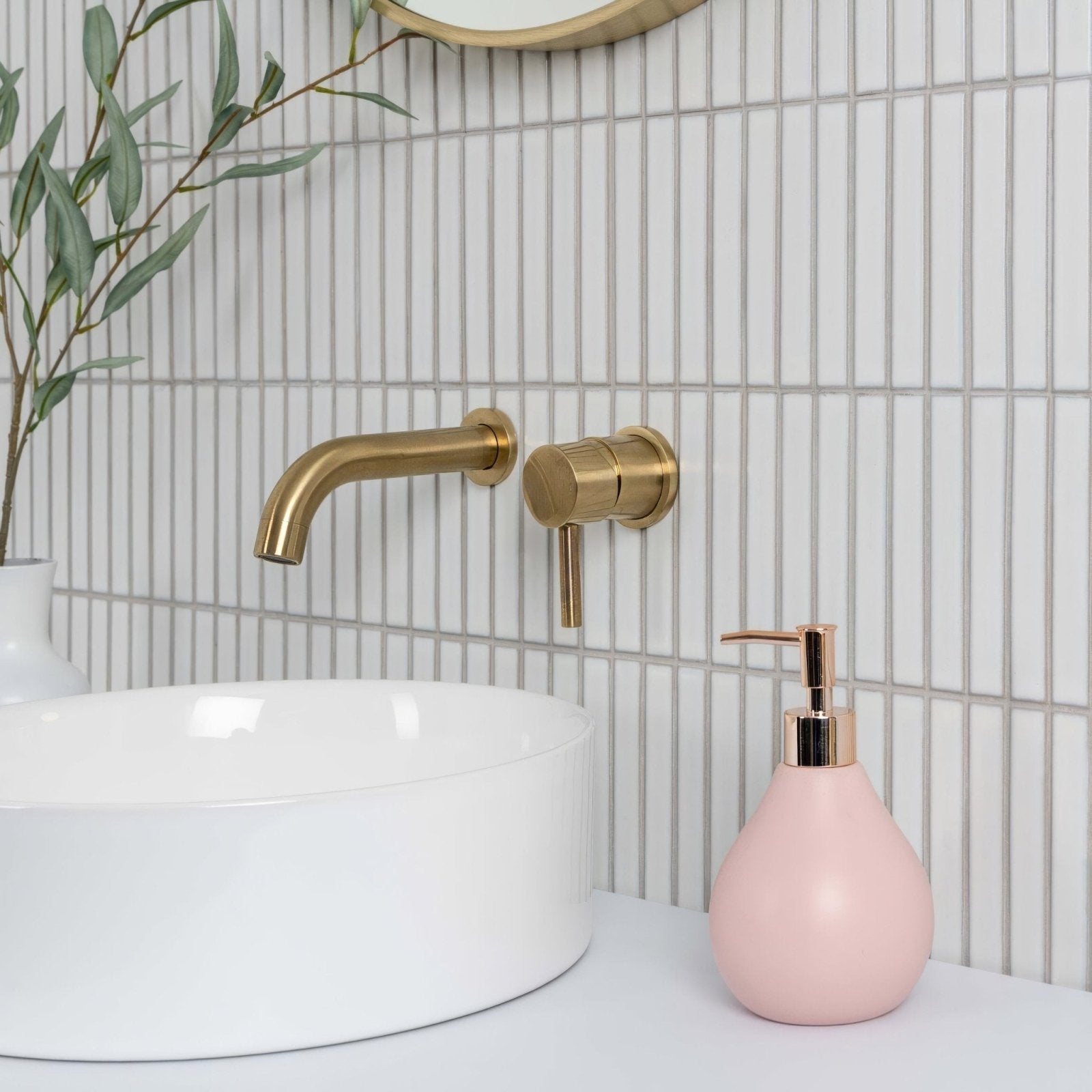 Kitkat White Mosaic white ceramic mosaic with a gold wall-mounted tap