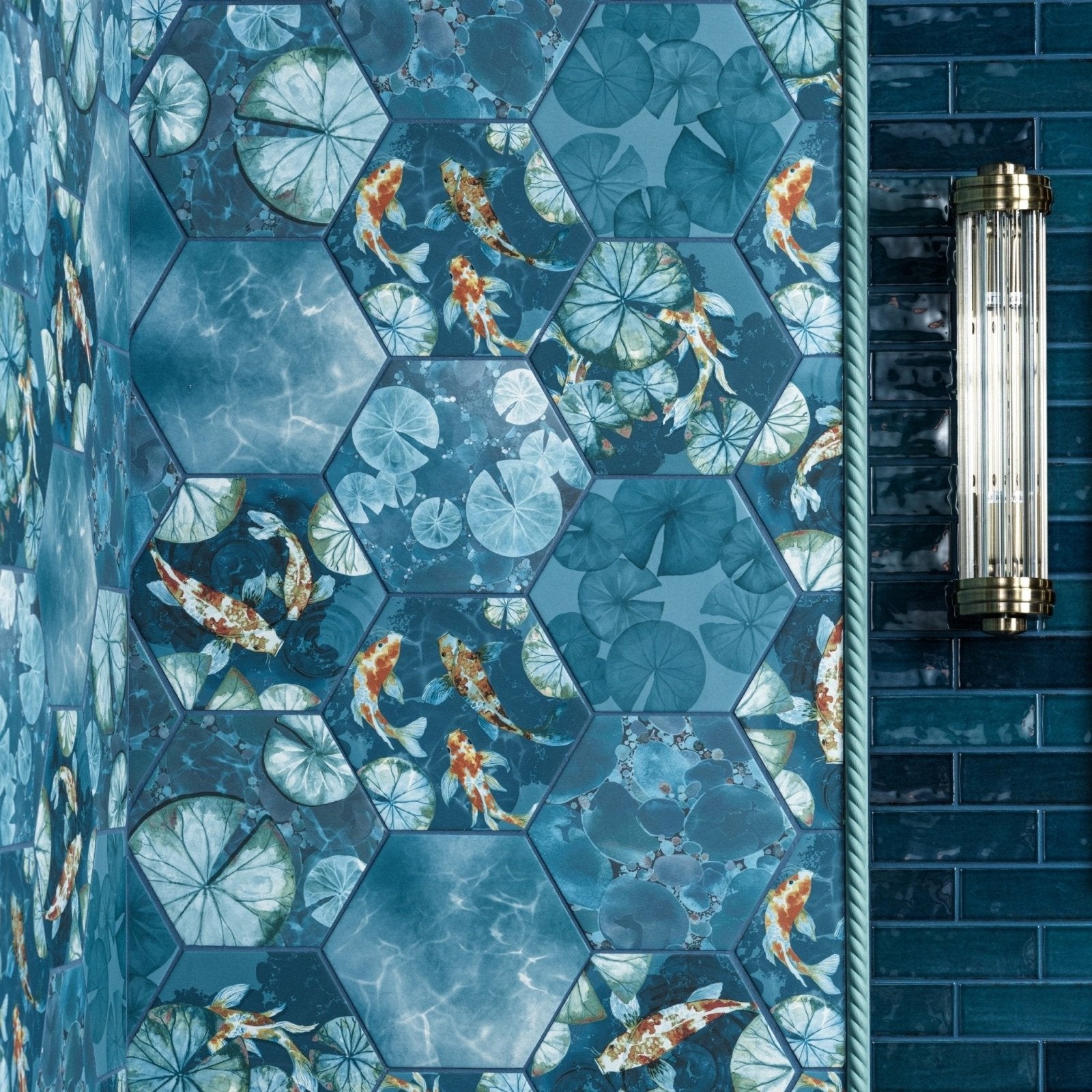 Blue hexagonal porcelain tiles from kiyosumi featuring detailed koi fish and lily pad patterns on a glossy surface