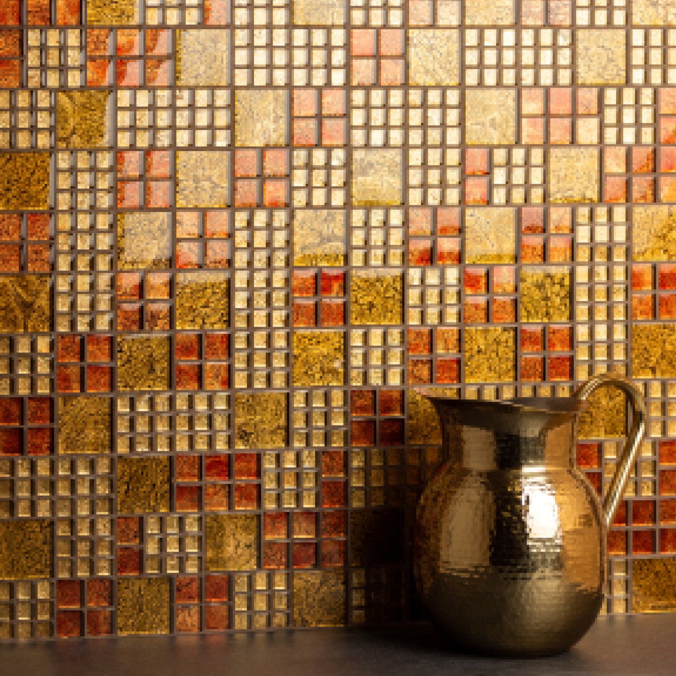 Kobushi Feng Shui Glass Mosaic gold, brown and amber glass mosaic with a hammered brass pitcher