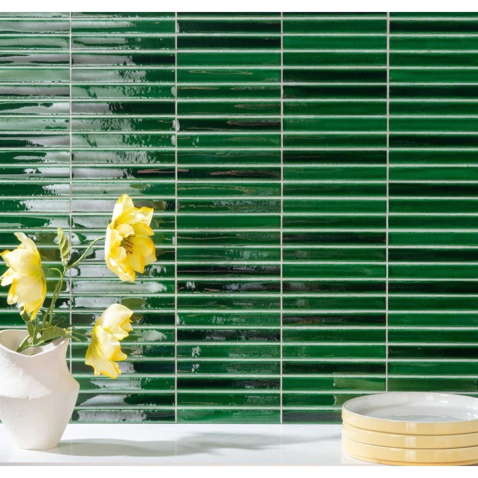 Vibrant emerald green glossy rectangular glass mosaic tile wall from koeda jungle crackle collection