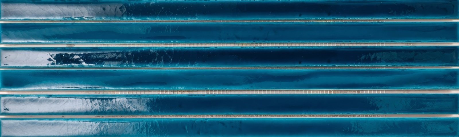 Koeda XL sapphire crackle teal glass mosaic tile with glossy finish and subtle horizontal ridges