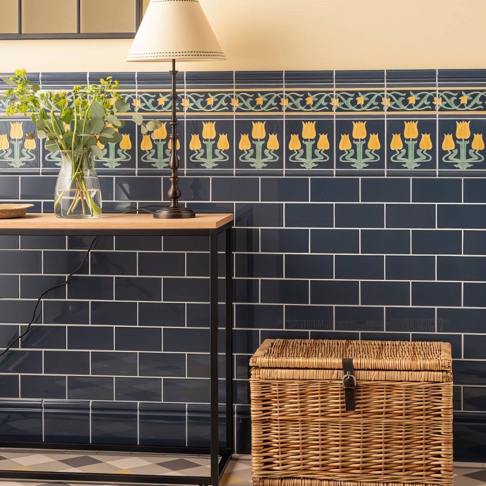 Woven wicker storage chest with black leather strap and buckle in ascot blue lafleur border design