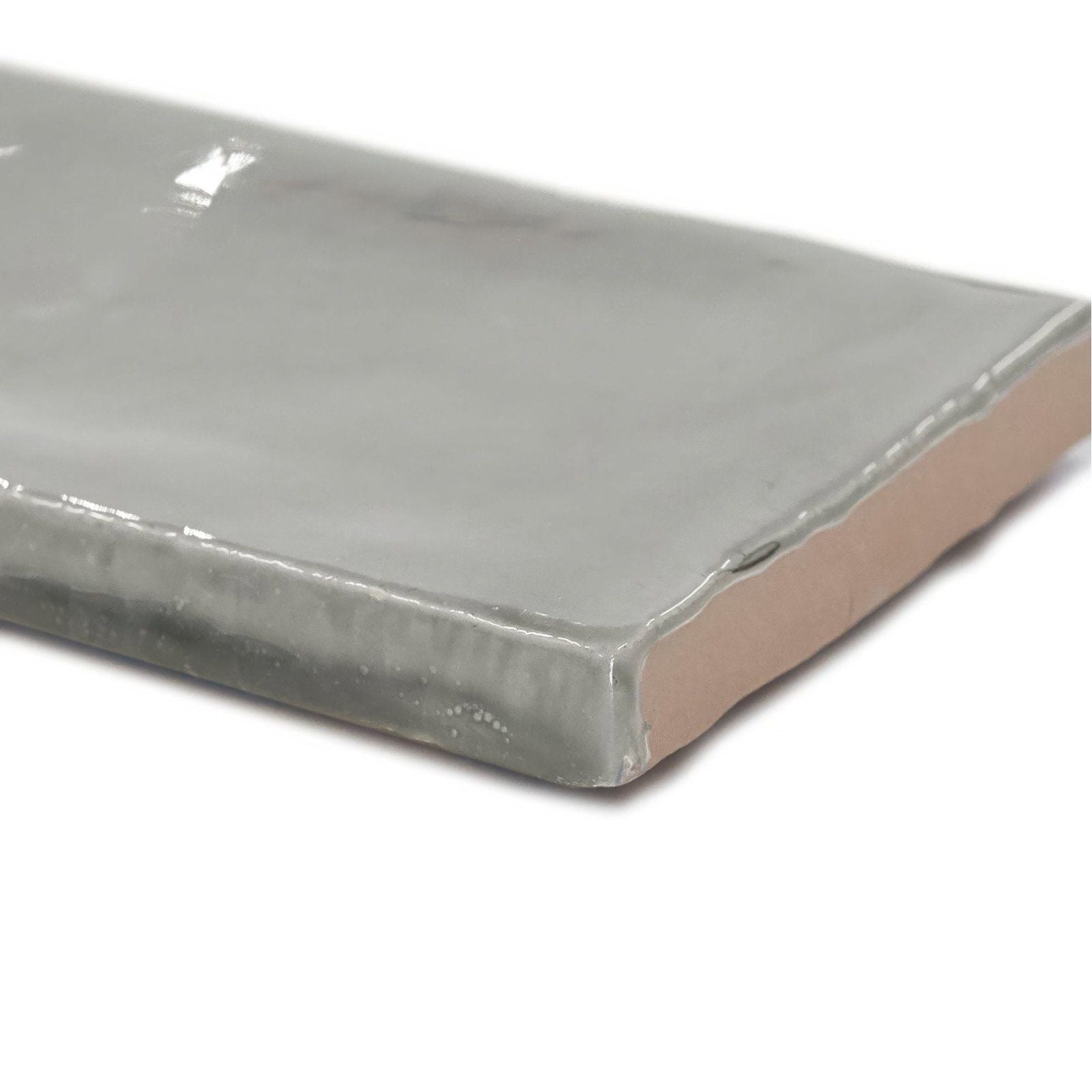 A sleek matte finished gray ceramic landscape haze grey tile with subtle sheen and slightly uneven edges