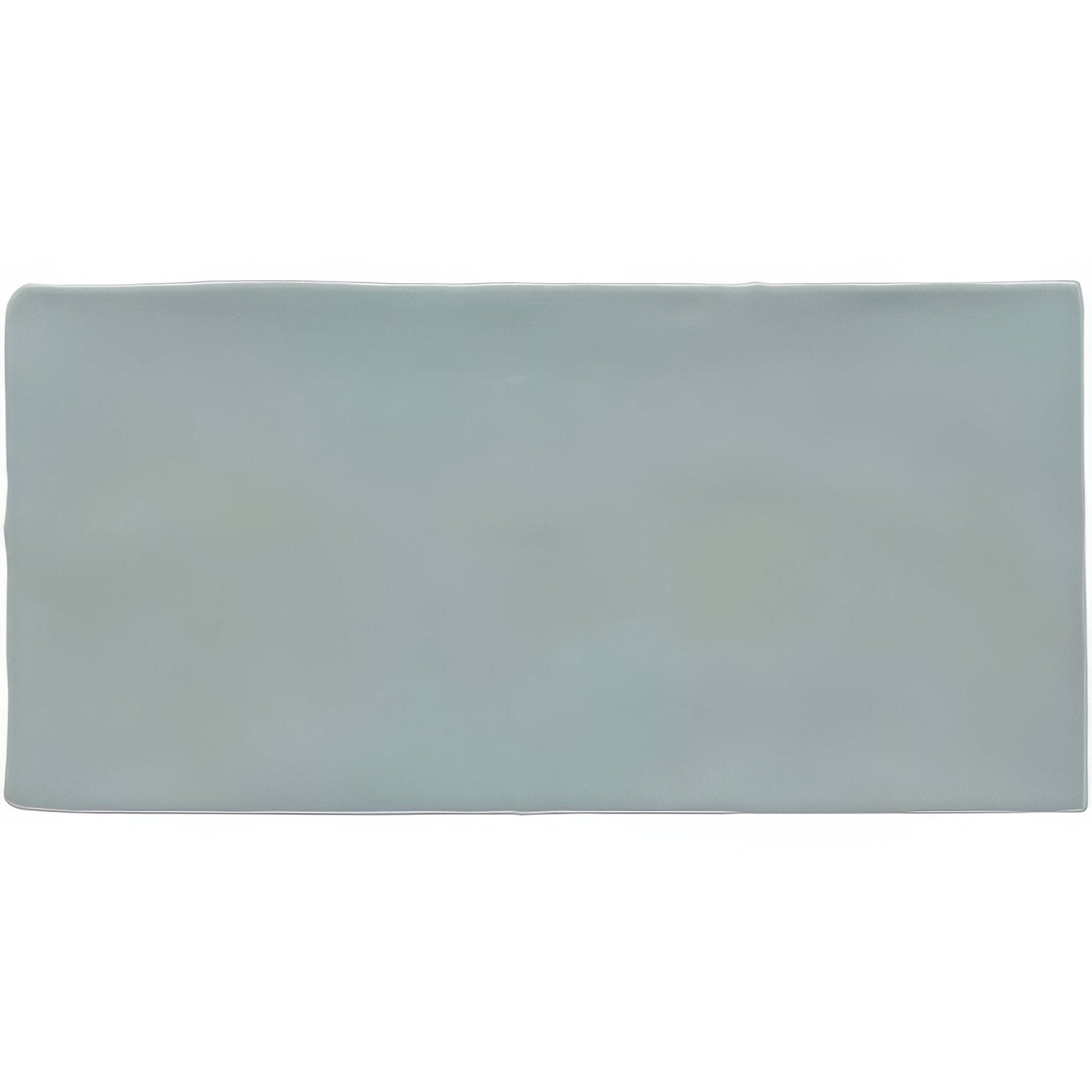 A rectangular matte-finished light blue ceramic wall tile lazul brick wall tile 20x10cm with rounded edges